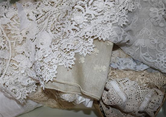 A collection of lace trimmings and hankies etc
